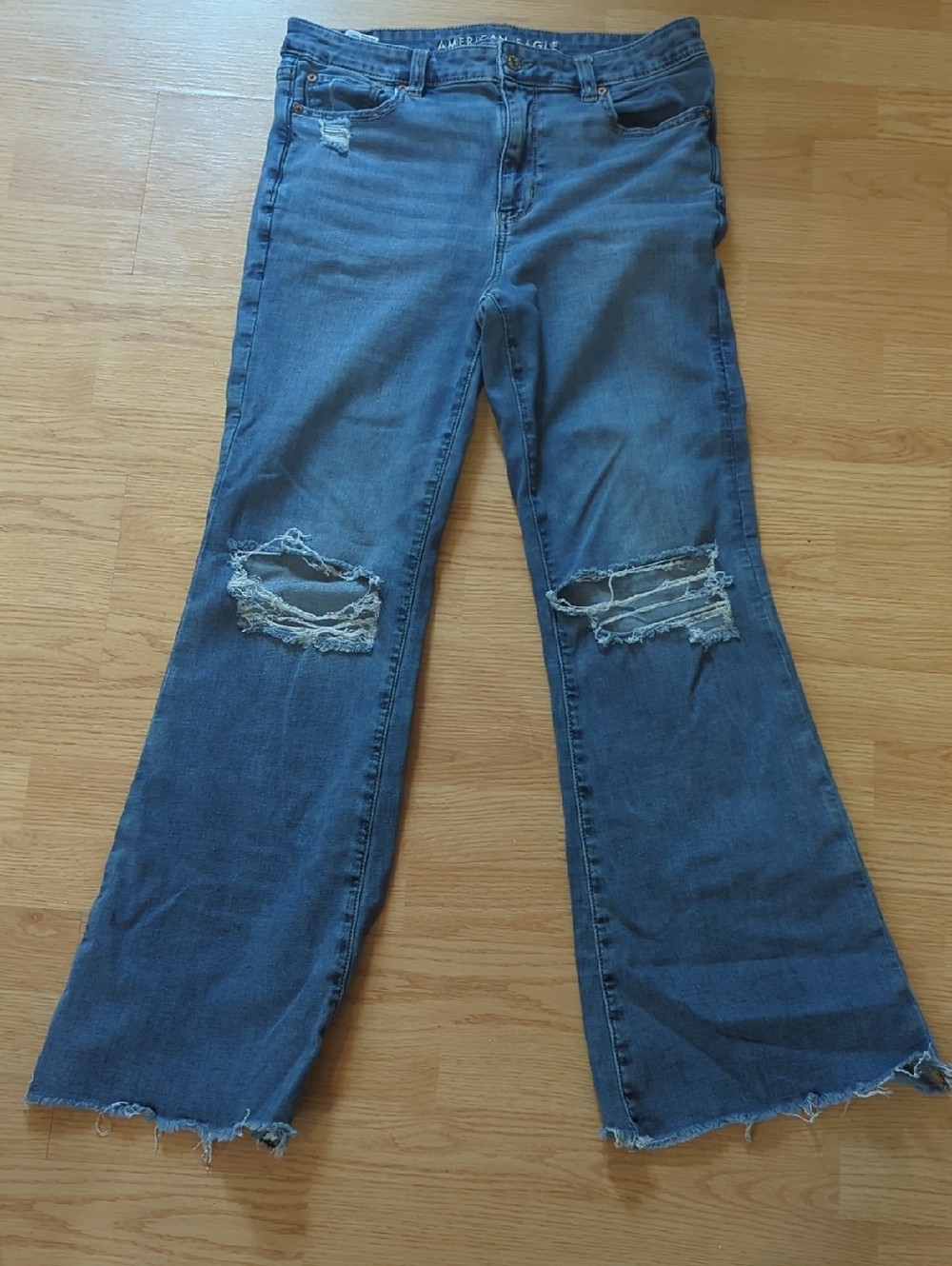 Distressed Blue Women's Flared American Eagle Jeans